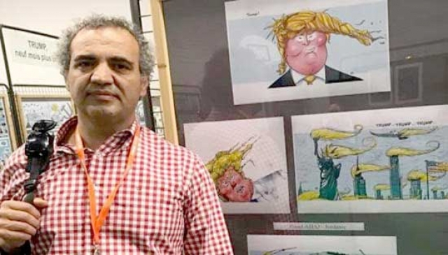  برنامج زيارة رسام الكاريكاتير الأردني عماد حجاج  إلى مدرسة الكاريكاتير بصفاقس